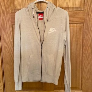 Women’s tan Nike zip-up hoodie